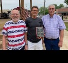 Although none of the coaches or members of the 1935 Grundy Center girls basketball team are alive, they were represented by relatives.  Chuck Goodman, Greg Goodman and Paul Harberts represented their mothers at the ceremony. The 1935 Spartan girls finished third in the state.